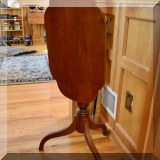 F12. Tilt top table.